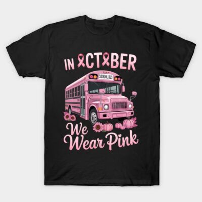 Black t-shirt with pink bus and "In October We Wear Pink" text, perfect for Breast Cancer Awareness Month.