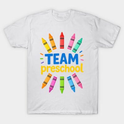 White t-shirt with colorful crayon design and "Team Preschool" print, perfect for educators or school events.
