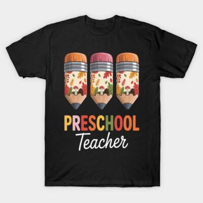 Black T-shirt with colorful pencil and leaf design, featuring "Preschool Teacher" text. Perfect for educators.