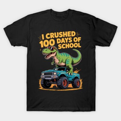 Black t-shirt with "I Crushed 100 Days of School" text, featuring a dinosaur on a truck graphic, fun school theme.