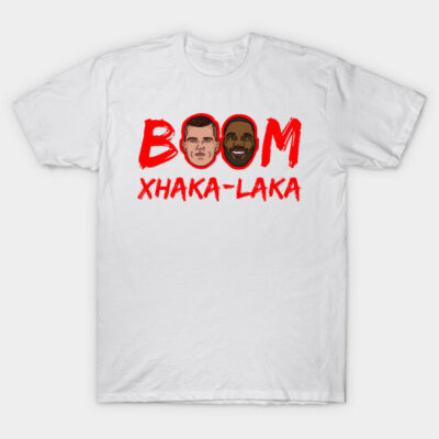 White t-shirt with "Boom Xhaka-Laka" text and cartoon faces in red, casual style, cotton material.