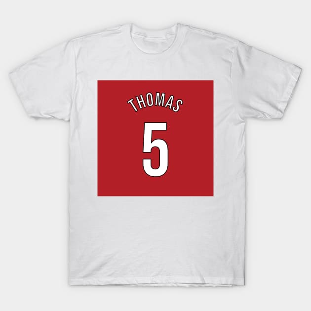 White t-shirt with red square, text "Thomas" and number "5" design. Ideal for casual wear, made of cotton.