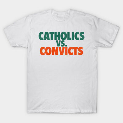 White t-shirt with bold green and orange "Catholics vs. Convicts" slogan, casual wear, cotton material.