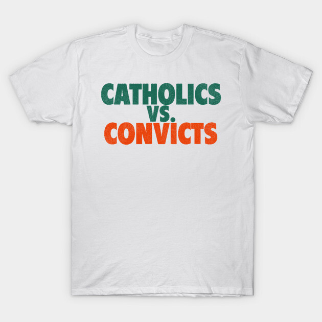 White t-shirt with bold green and orange "Catholics vs. Convicts" slogan, casual wear, cotton material.