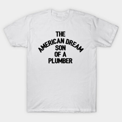 White t-shirt with "The American Dream Son of a Plumber" text, casual style, soft cotton, unisex design, comfortable fit.