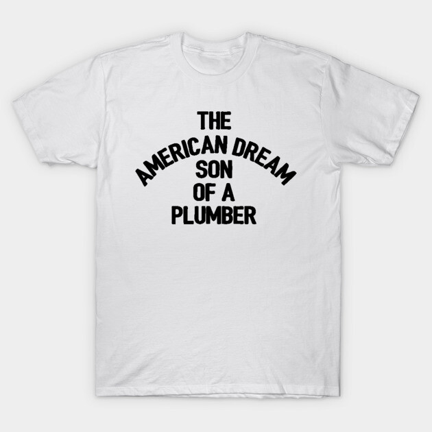 White t-shirt with "The American Dream Son of a Plumber" text, casual style, soft cotton, unisex design, comfortable fit.