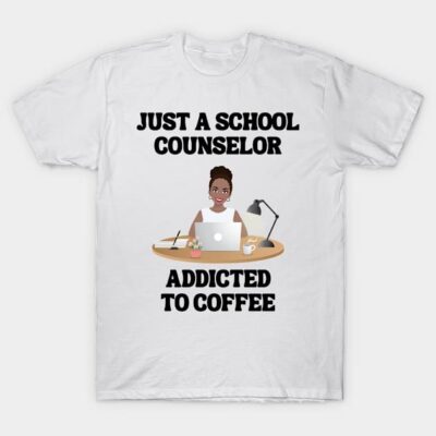 White t-shirt with "Just a School Counselor Addicted to Coffee" text and illustration of person at desk with laptop.