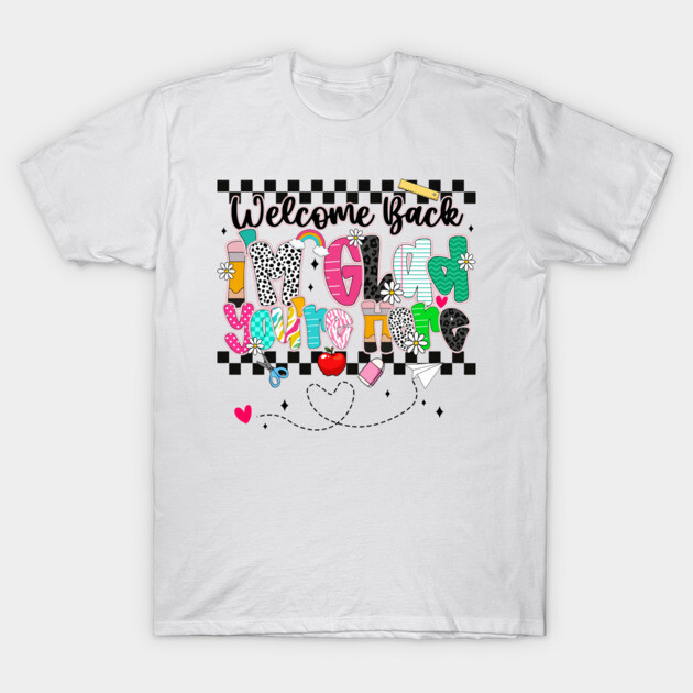 White t-shirt with colorful "Welcome Back" graphic design, featuring playful fonts and school-themed illustrations.