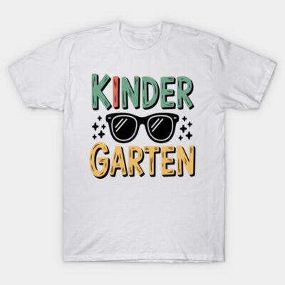 White kindergarten-themed t-shirt with colorful lettering and sunglasses graphic, casual style, cotton material.