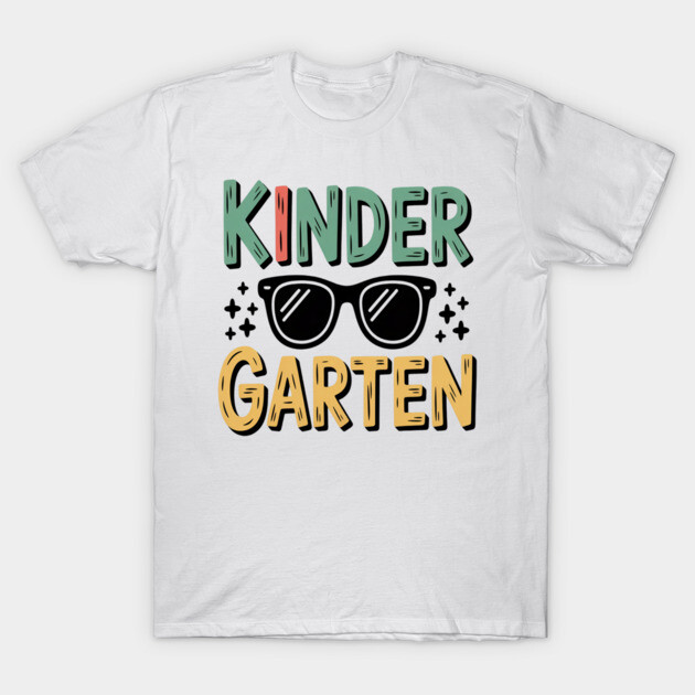 White kindergarten-themed t-shirt with colorful lettering and sunglasses graphic, casual style, cotton material.