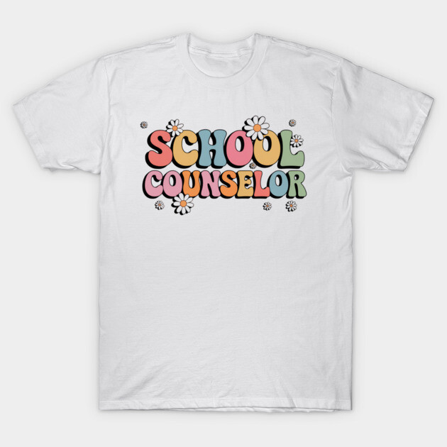 White cotton t-shirt with colorful "School Counselor" text and floral design, casual style, unisex fit.