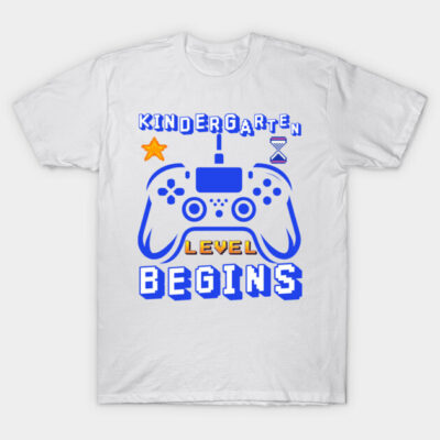White T-shirt with blue gaming controller design, text "Kindergarten Level Begins," playful style for kids.