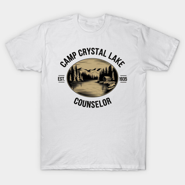 White t-shirt with "Camp Crystal Lake Counselor" print, featuring a vintage lake and forest design, cotton material.