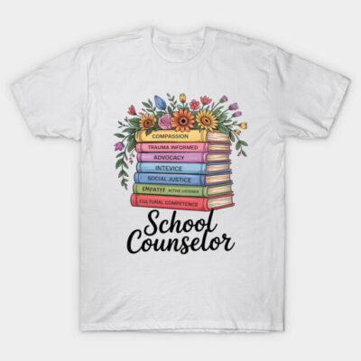 White t-shirt with colorful book stack and flower design, featuring "School Counselor" text. Ideal for education professionals.