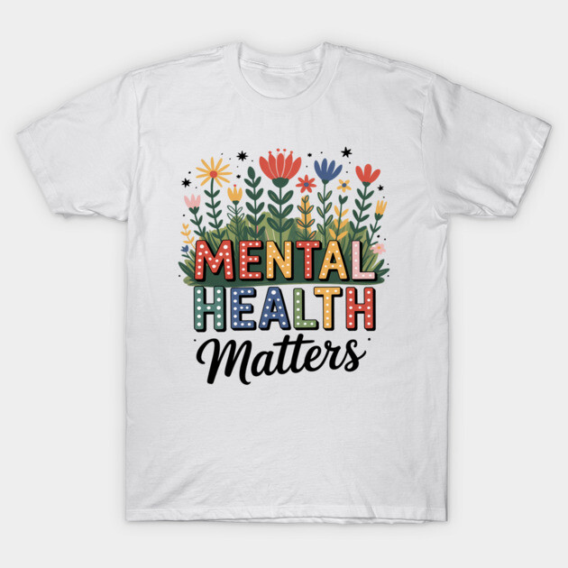 White T-shirt with colorful "Mental Health Matters" text and floral design, casual style, cotton material.