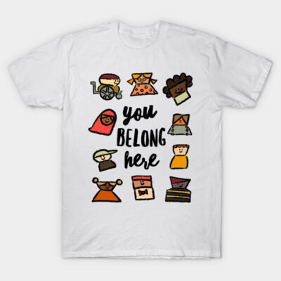 White t-shirt with diverse character illustrations and "You Belong Here" text, casual wear, cotton material.