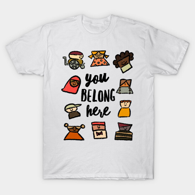 White t-shirt with diverse character illustrations and "You Belong Here" text, casual wear, cotton material.
