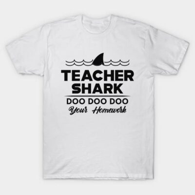White "Teacher Shark" T-shirt with black text and shark fin graphic, perfect for educators, casual style, 100% cotton.