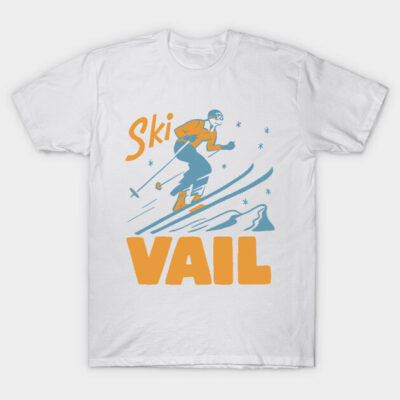 White t-shirt with vintage ski Vail graphic in orange and blue, perfect for winter sports enthusiasts. 100% cotton.