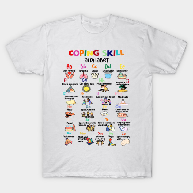 White t-shirt with colorful "Coping Skill Alphabet" design, featuring letters and illustrations for stress relief activities.