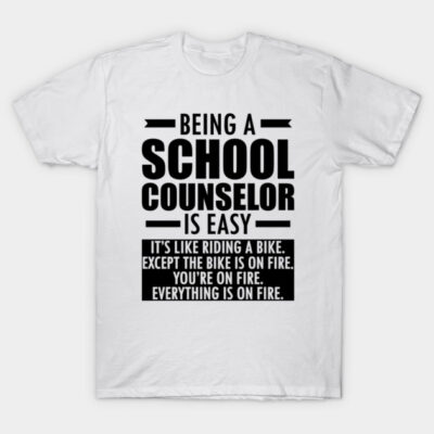 White school counselor novelty t-shirt with humorous black text print; casual cotton top for educators.