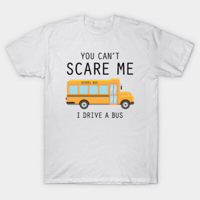 White T-shirt with yellow school bus graphic and "You Can't Scare Me, I Drive a Bus" text, casual wear.