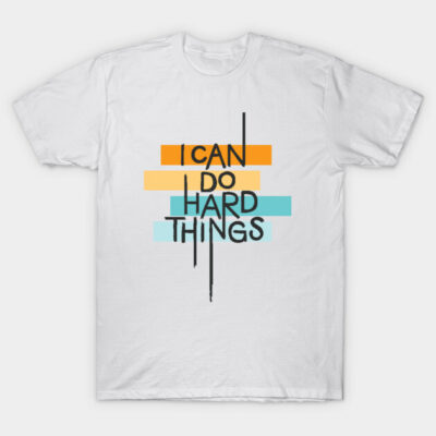 White motivational T-shirt with colorful "I Can Do Hard Things" text design, casual cotton wear for everyday inspiration.