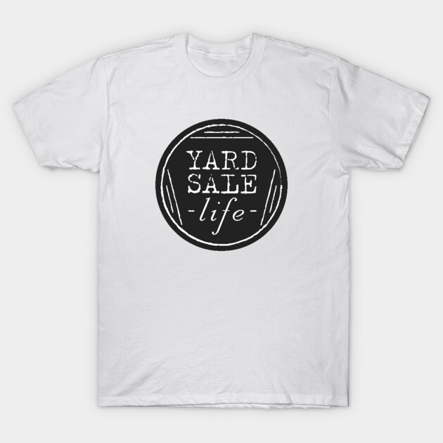 White t-shirt featuring "Yard Sale Life" black circle graphic, casual style, soft cotton material, perfect for everyday wear.