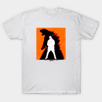 White graphic t-shirt with orange and black design featuring silhouette and figure, casual cotton wear.