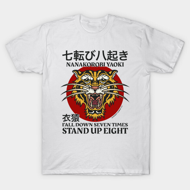 White t-shirt with bold tiger graphic and motivational text, Japanese style, ideal for casual wear, cotton material.