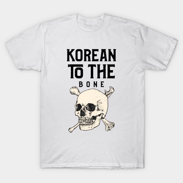 White T-shirt with "Korean to the Bone" text and skull graphic, casual style, soft cotton material.