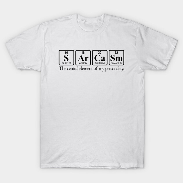 White t-shirt with black periodic table design spelling "Sarcasm," humorous text, casual style, cotton material.