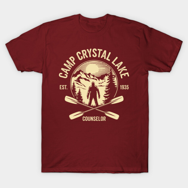 Maroon Camp Crystal Lake t-shirt with vintage outdoorsy design, featuring oars and forest scene, 100% cotton casual wear.