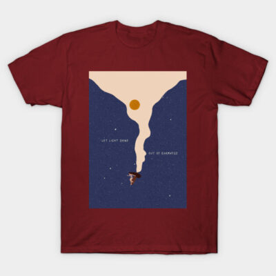 Maroon t-shirt with abstract space-themed design, featuring "Let Light Shine Out of Darkness" text, cotton material.