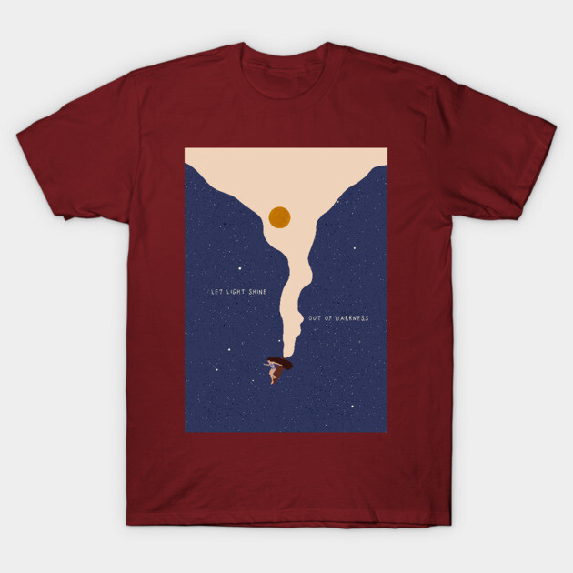 Maroon t-shirt with abstract space-themed design, featuring "Let Light Shine Out of Darkness" text, cotton material.