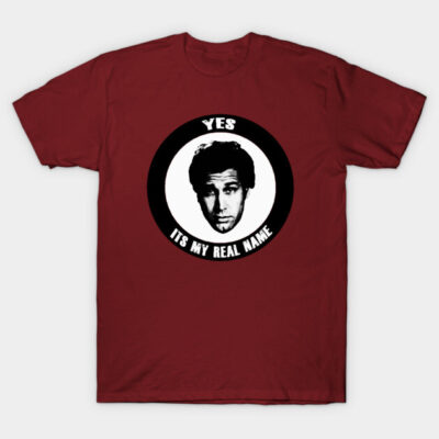 Burgundy t-shirt with black and white graphic design, featuring text "Yes, It's My Real Name", casual wear.