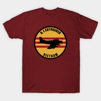 Burgundy t-shirt with A-1 Skyraider Vietnam graphic, round emblem design, casual wear, cotton material.