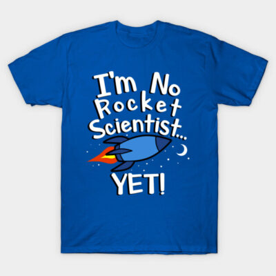 Blue t-shirt with "I'm No Rocket Scientist... Yet" text and rocket graphic, casual style, cotton material.