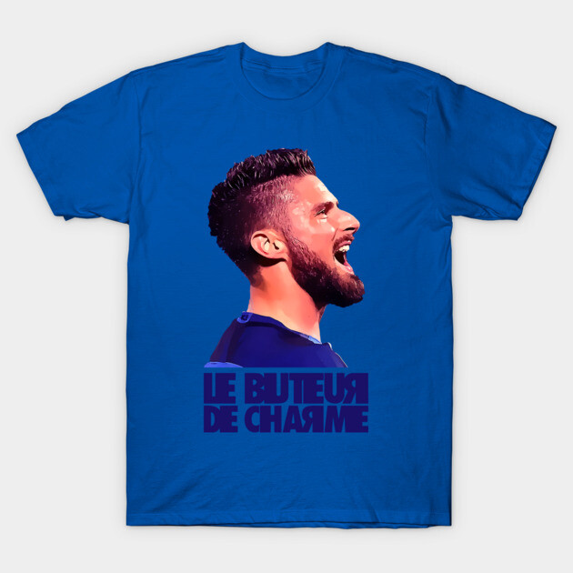 Blue graphic t-shirt with "Le Buteur De Charme" text, featuring artistic face design. Casual wear, cotton material.