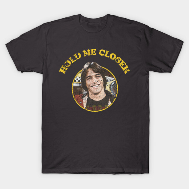 Black cotton t-shirt with vintage graphic and "Hold Me Closer" text, casual wear.