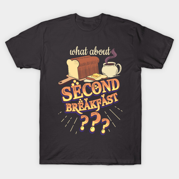 Black t-shirt with "What About Second Breakfast" text and breakfast graphic, casual style, cotton material.