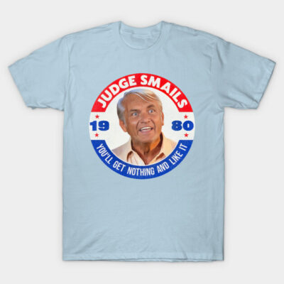 Light blue graphic T-shirt featuring retro design with bold text, casual style, perfect for everyday wear.