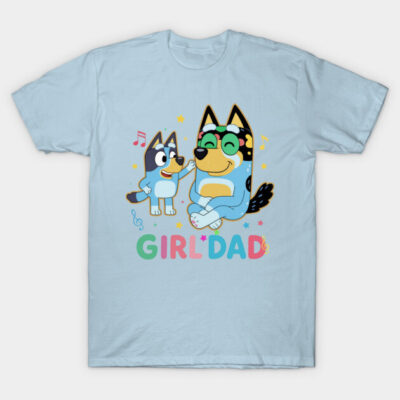 Light blue "Girl Dad" t-shirt featuring playful cartoon dogs, music notes, and stars. Perfect for casual wear.
