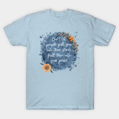 Light blue T-shirt with motivational quote and floral design, casual wear, cotton material.