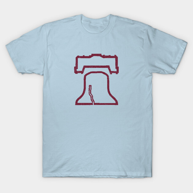Light blue t-shirt with red stylized Liberty Bell outline design, casual wear, cotton material, unisex style.