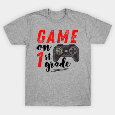 Gray t-shirt with "Game On 1st Grade" text and game controller graphic, casual wear for kids, cotton material.