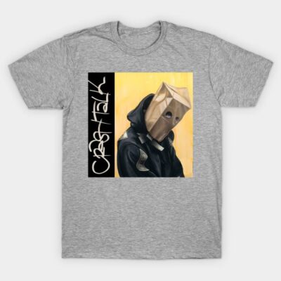 Gray graphic t-shirt with artistic design featuring a hooded figure and graffiti text. Casual wear, soft cotton material.