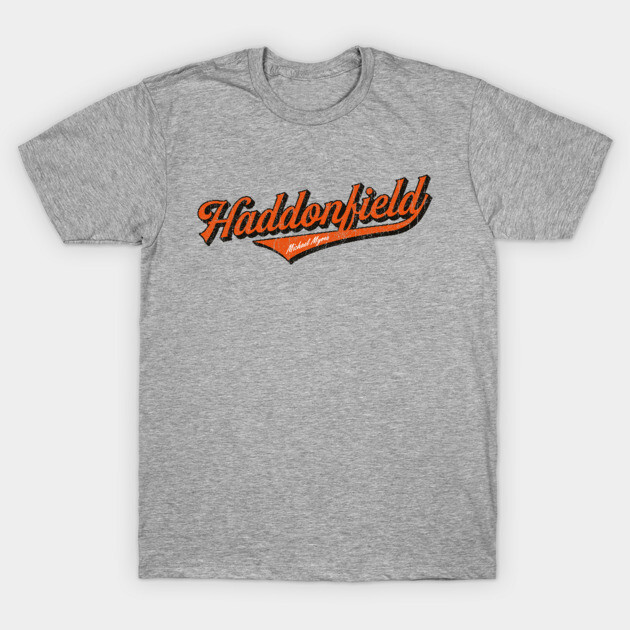 Gray cotton t-shirt with "Haddonfield" in orange script, casual style, ideal for everyday wear.