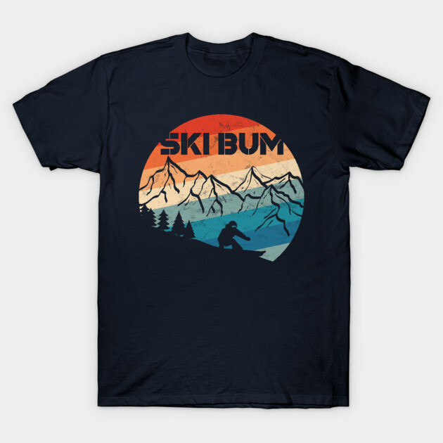 Navy blue t-shirt with retro ski design, featuring mountains and sunset colors, ideal for outdoor enthusiasts.