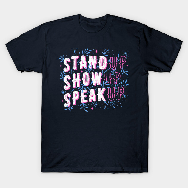 Navy blue t-shirt with "Stand Up Show Up Speak Up" text in pink and white, casual style, made from soft cotton fabric.